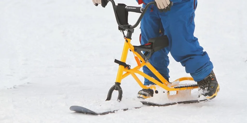 A bicycle and snowboard? Snowscooting is also recommended for children